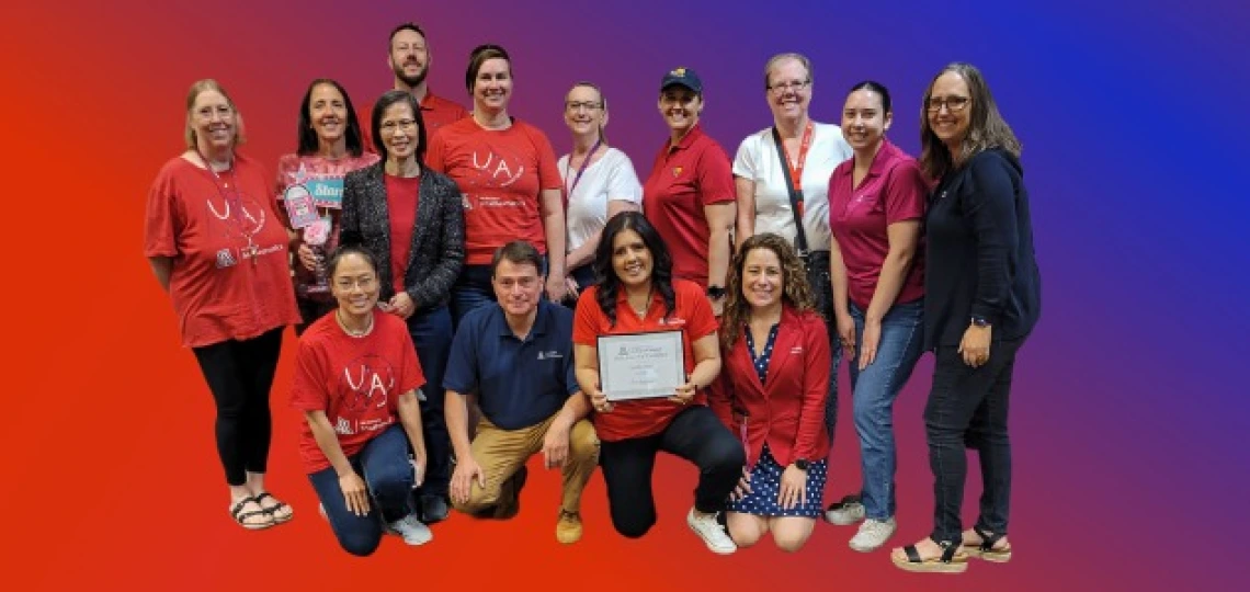 Nellie Rios surrounded by Math Staff